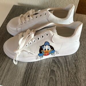 Brand new women’s size 9.5 Donald Duck Skater Shoes white